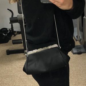 Black satin Judith Leiber purse
